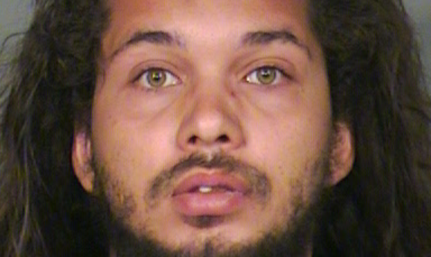 (Photo of Travis Salmon provided by the Chandler Police Department)...