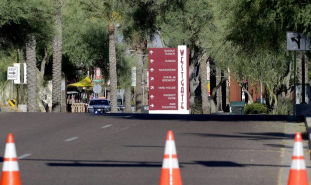 The Westgate retail district is closed off Thursday, May 21, 2020, in Glendale, Ariz. Police say on...