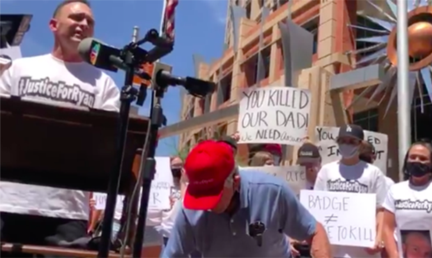 Steven Whitaker speaking during a gathering outside of Phoenix City Hall on Thursday. (Screenshot)...