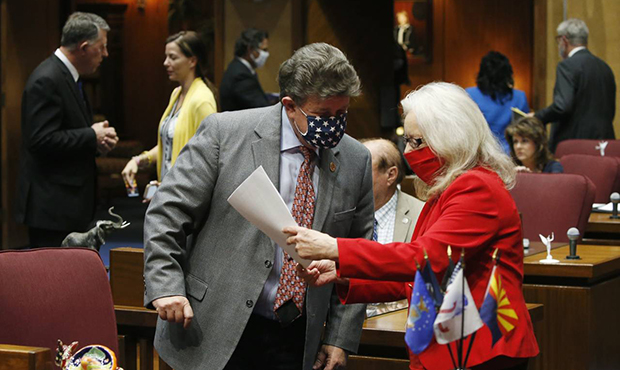 Sen. Lela Alston, right, D-Phoenix, talks with Senate Minority Leader David Bradley, left, D-Tucson...