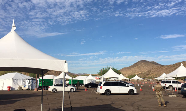Drive-thru COVID-19 testing takes place at South Mountain Park in Phoenix on July 17. (KTAR News Ph...