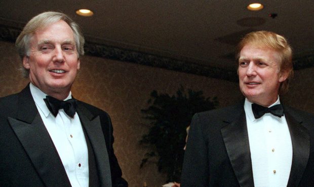 FILE - In this Nov. 3, 1999 file photo, Robert Trump, left, joins then real estate developer and pr...