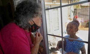 Homes with grandparents weigh virus risk as school starts