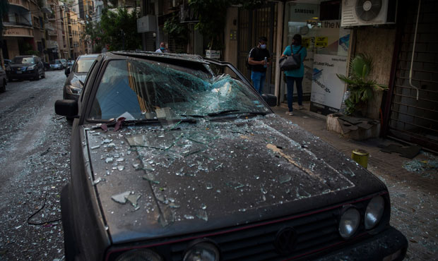 A car is damaged after a large explosion on August 4, 2020 in Beirut, Lebanon. Video shared on soci...