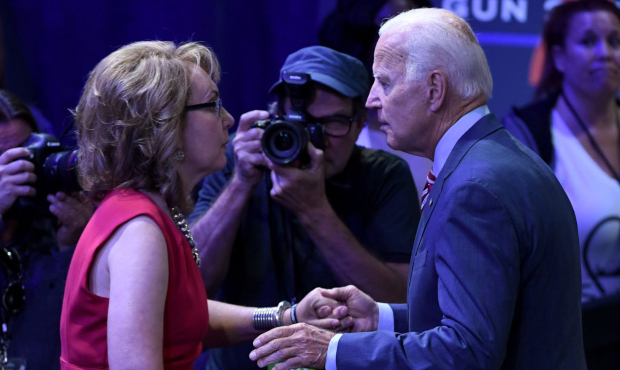 Former U.S. Rep. Gabrielle Giffords (L) greets Democratic presidential candidate, former U.S. Vice ...