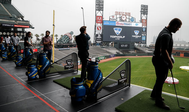 Players participate in a Topgolf Live event at Oracle Park in San Francisco, California, on Nov. 7,...