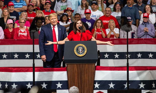 Sen. Martha McSally (R-AZ) speaks to the crowd with President Donald Trump at a rally at the Arizon...