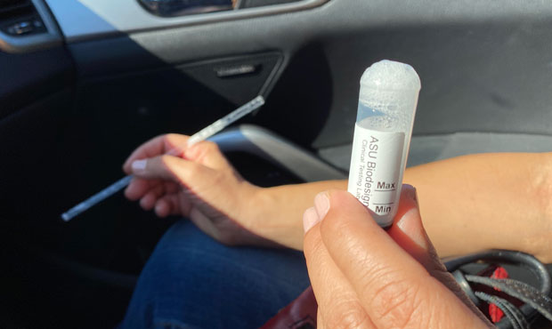 A saliva sample for ASU Biodesign Institute COVID-19 testing. (KTAR News Photo)...