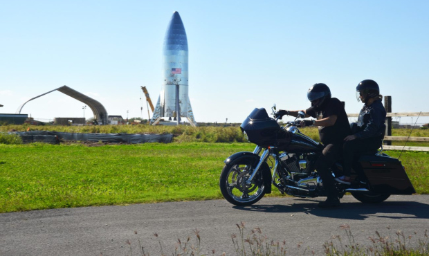 A motorcyclist rides off in his Harley Davidson Saturday, Jan. 12, 2019, across from SpaceX prototy...