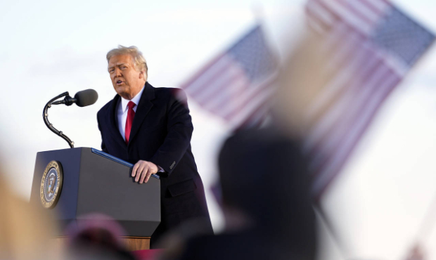 President Donald Trump speaks before boarding Air Force One at Andrews Air Force Base, Md., Wednesd...