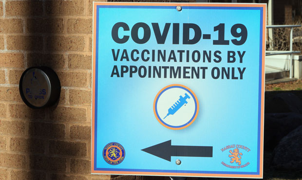 Signage is in place to direct people to COVID-19 vaccinations at the Yes We Can Community Center on...