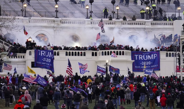 Violent protesters, loyal to President Donald Trump, storm the Capitol, Wednesday, Jan. 6, 2021, in...