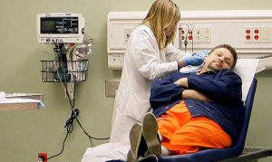 Arizona to pay $1M for not improving prison health care as promised