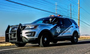 DPS trooper hit by vehicle, woman injured in officer-involved shooting