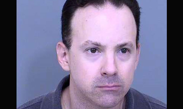 Brett James Smith (Booking Photo via Arizona Attorney General's Office)...