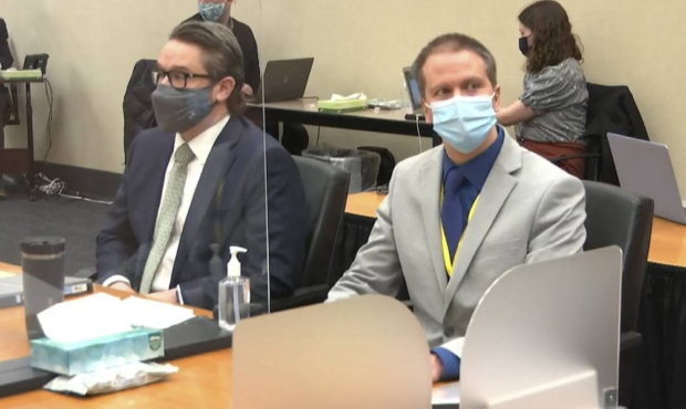 In this image from video, defense attorney Eric Nelson, left, and defendant, former Minneapolis pol...