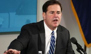 Gov. Ducey calls resistance to ban on local mask mandates 'grandstanding'