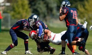 Parents wary of football concussions but let kids play other contact sports