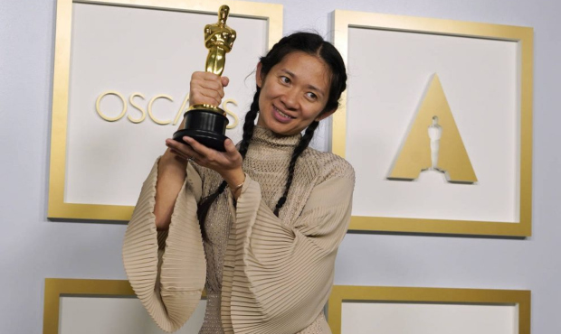 Director/Producer Chloe Zhao, winner of the award for best picture for "Nomadland," poses in the pr...