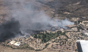 Forward progress stopped on wildfire that destroyed structures in Bagdad
