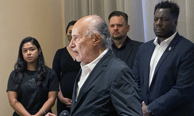 Attorney Billy Murphy speaks at podium, at a news conference after filing a lawsuit alleging Phoeni...