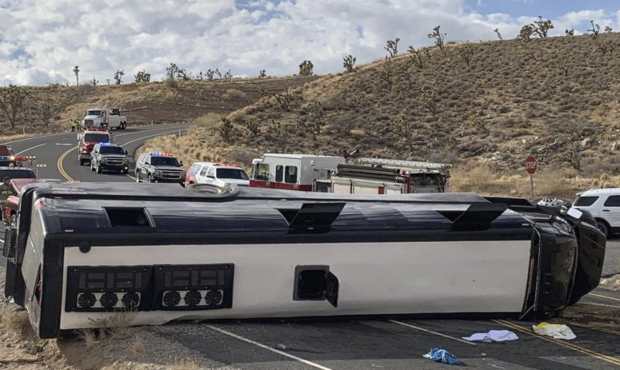 This photo provided by the Mohave County Sheriff's Office shows a Las Vegas-based tour that rolled ...