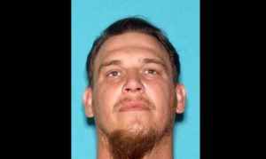 Suspect flees after hitting Scottsdale officer's motorcycle, taking ambulance