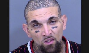 Man arrested at Mesa hotel on burglary, weapons charges