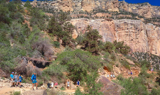 In this file photo, hikers break at the Mile-and-Half Resthouse on the the Bright Angel Trail in Gr...