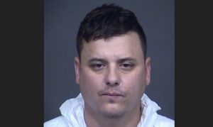 Suspect arrested on domestic violence charges after Mesa police shooting