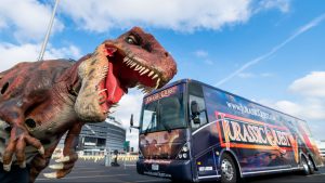 Robot dinosaurs invade Gila River Arena lot for drive-thru Jurassic Quest