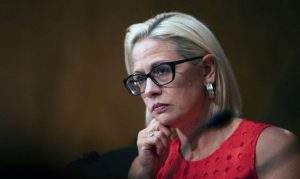 Sinema slams Ducey plan to give more funds to schools that follow his rules