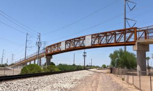 Footbridge over railroad tracks on trail near downtown Gilbert now open