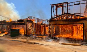 Second-alarm fire destroys 4 homes under construction at lot in Phoenix