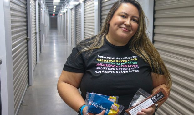 Jaclyn Brown, volunteer coordinator at Shot in the Dark, visits the nonprofit’s storage facility....