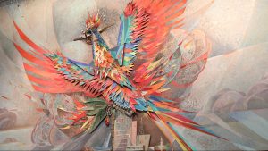 'The Phoenix' mural back on display at Sky Harbor rental car center