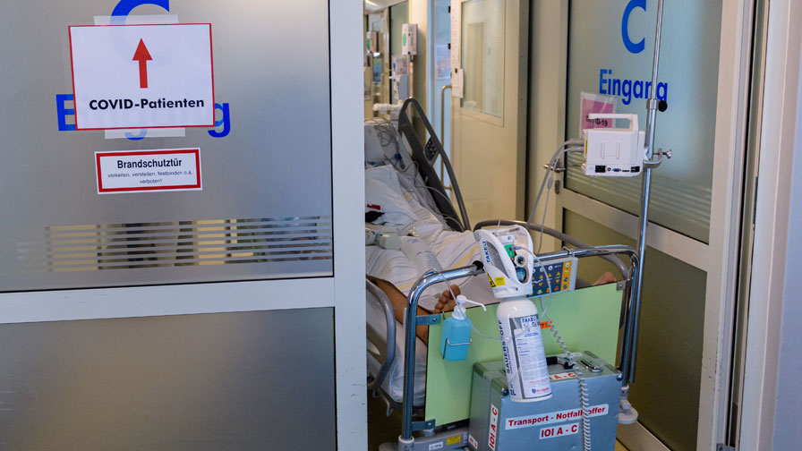 A doctor tends to a patient on the Covid-19 intensive care unit at University Hospital Leipzig on N...