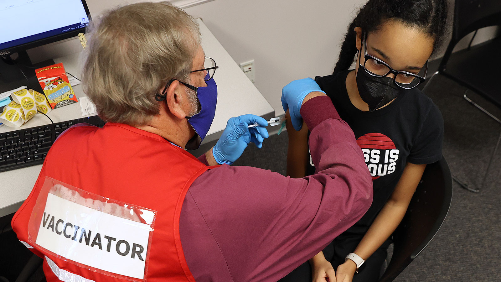 A child receives the Pfizer BioNTech COVID-19 vaccination on Nov. 4, 2021 in Annandale, Virginia. T...