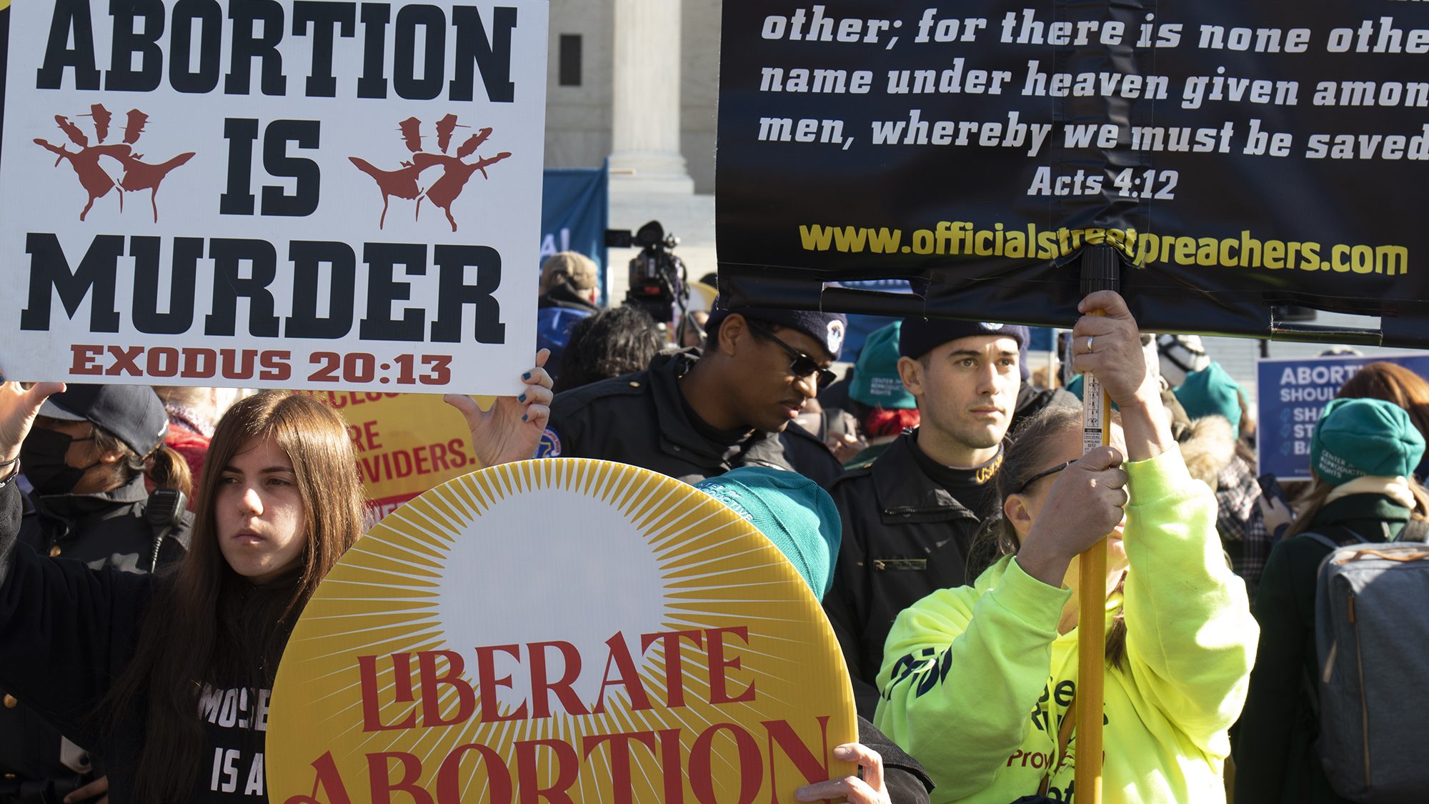 Hundreds of protesters, from both sides of the abortion debate, rallied Wednesday outside the Supre...