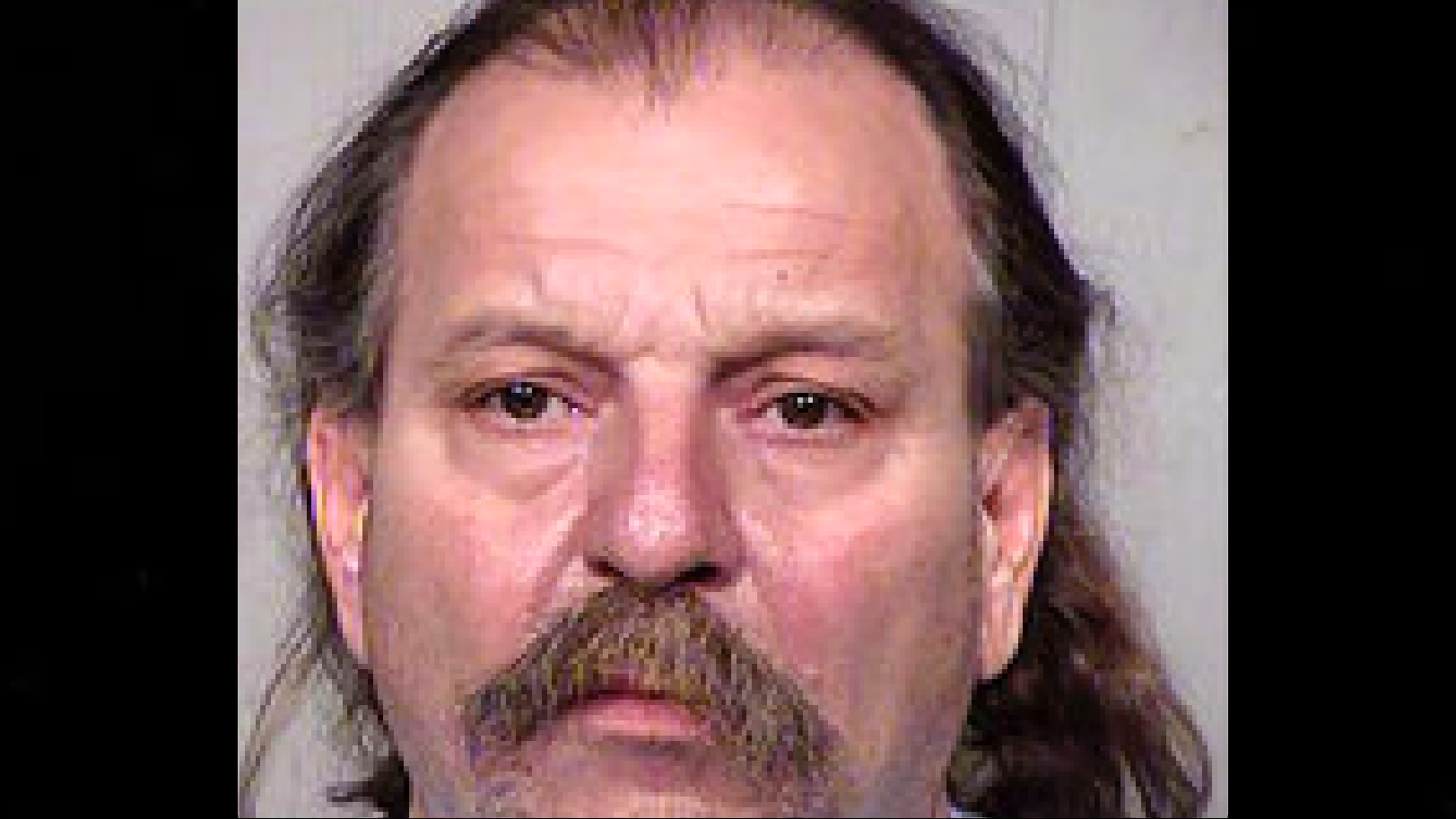 This undated photo provided by the Maricopa County Sheriff's Office shows Charles Eugene Robbins of...