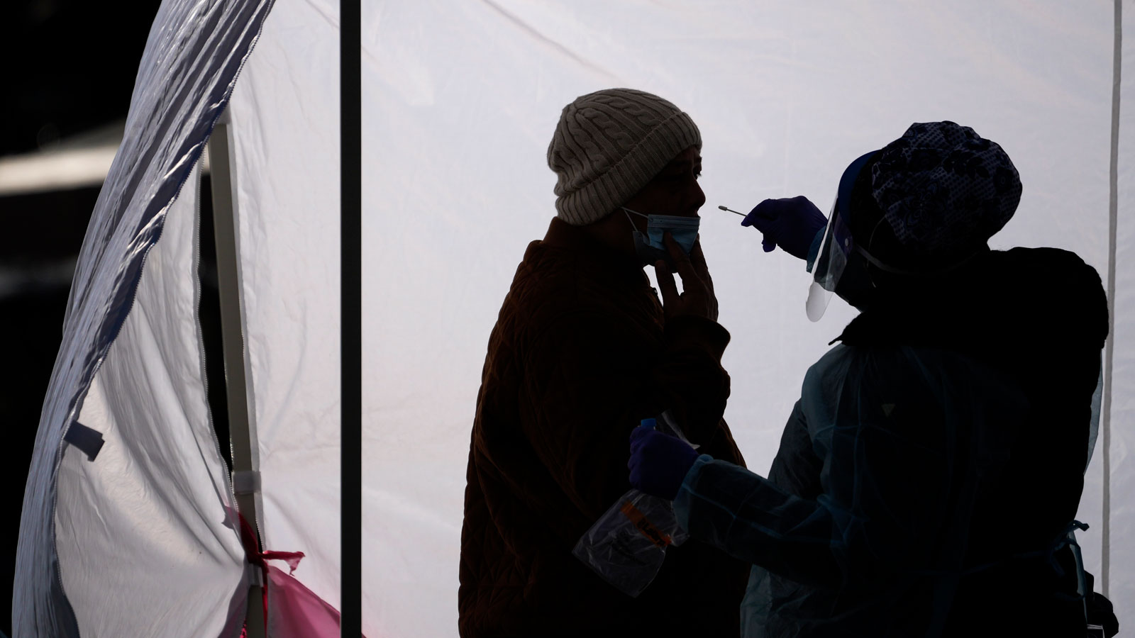A man is tested for COVID-19 at a free testing site in Farragut Square in downtown on Jan. 10, 2022...