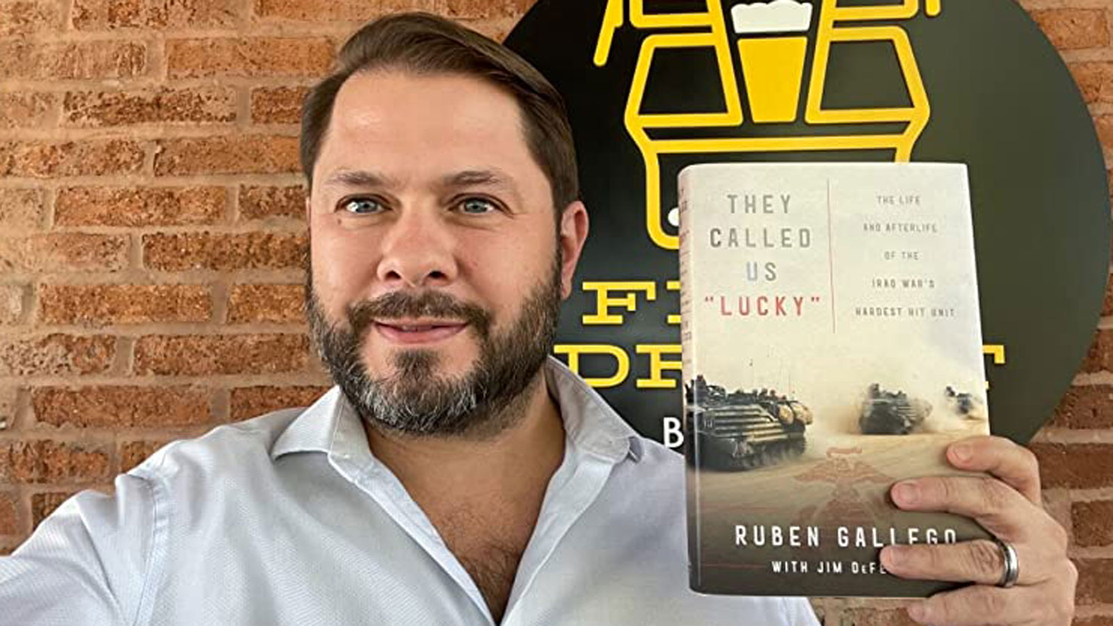 U.S. Rep. Ruben Gallego of Arizona holds a copy of his memoir. (Amazon.com Photo)...