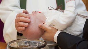 Phoenix priest resigns, baptisms invalidated over incorrect word during rite