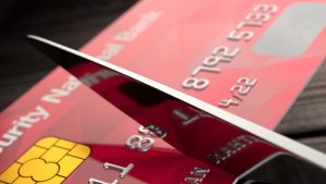 Dave Ramsey says: Wipe out $5K credit debt with settlement cash, then cut up card