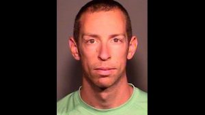 Chandler police arrest man accused of beating a dog