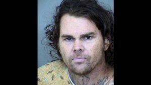Suspect in shooting of Phoenix officer hospitalized again after trip to jail