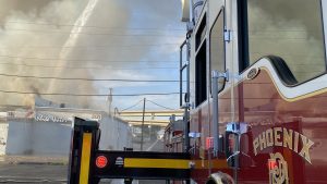 Crews battle 4-alarm fire at Phoenix scrapyard early Sunday