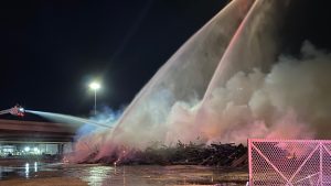 Fire at rail yard lights up Phoenix night, smoke shuts down freeway for 2 hours