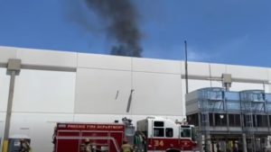 Firefighters extinguish rooftop fire on large commercial building in Phoenix