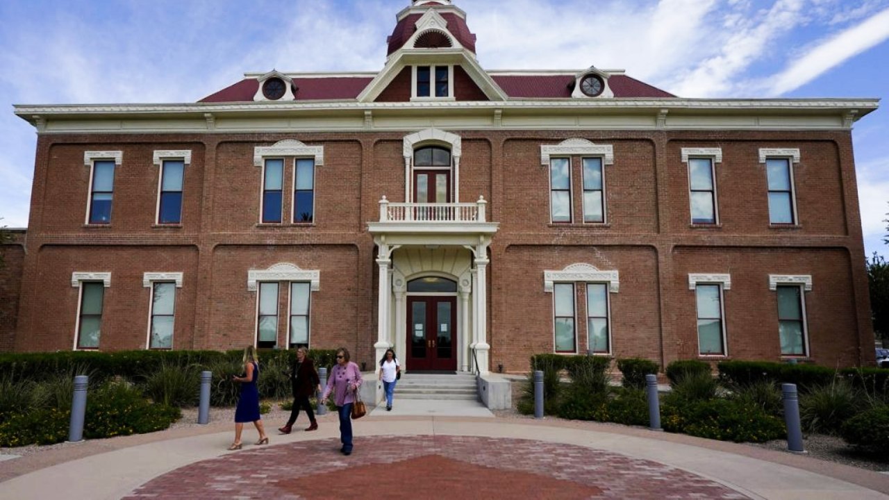 People exit the 1891 Courthouse after a meeting with the Pinal County Attorney and Board of Supervi...